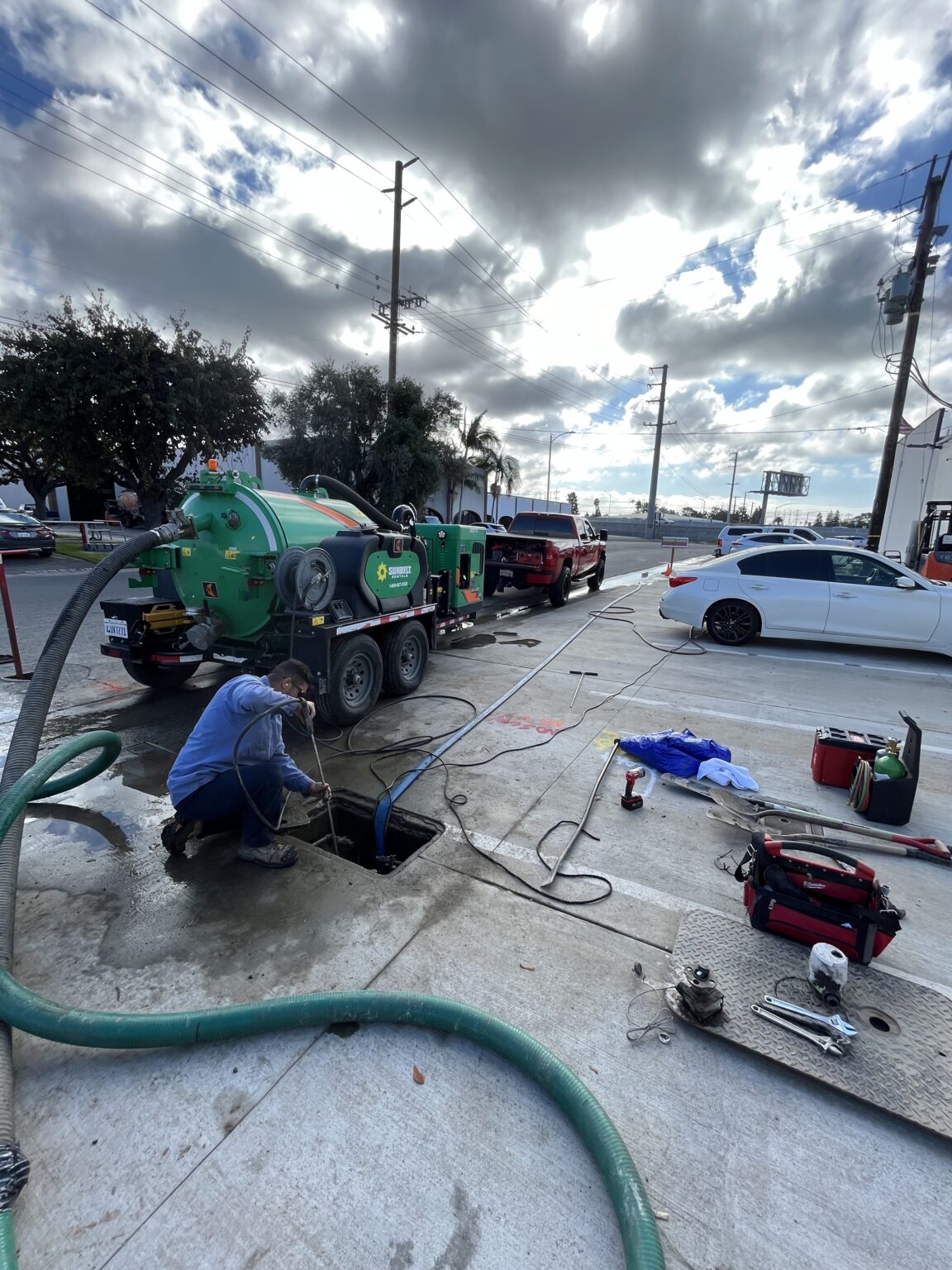 Lay It Rite Plumbing crew working on a main sewer line at the street in Orange County