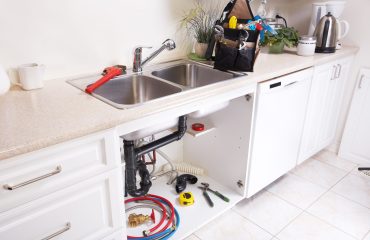 Kitchen Water tap and sink. Renovation  and plumbing.